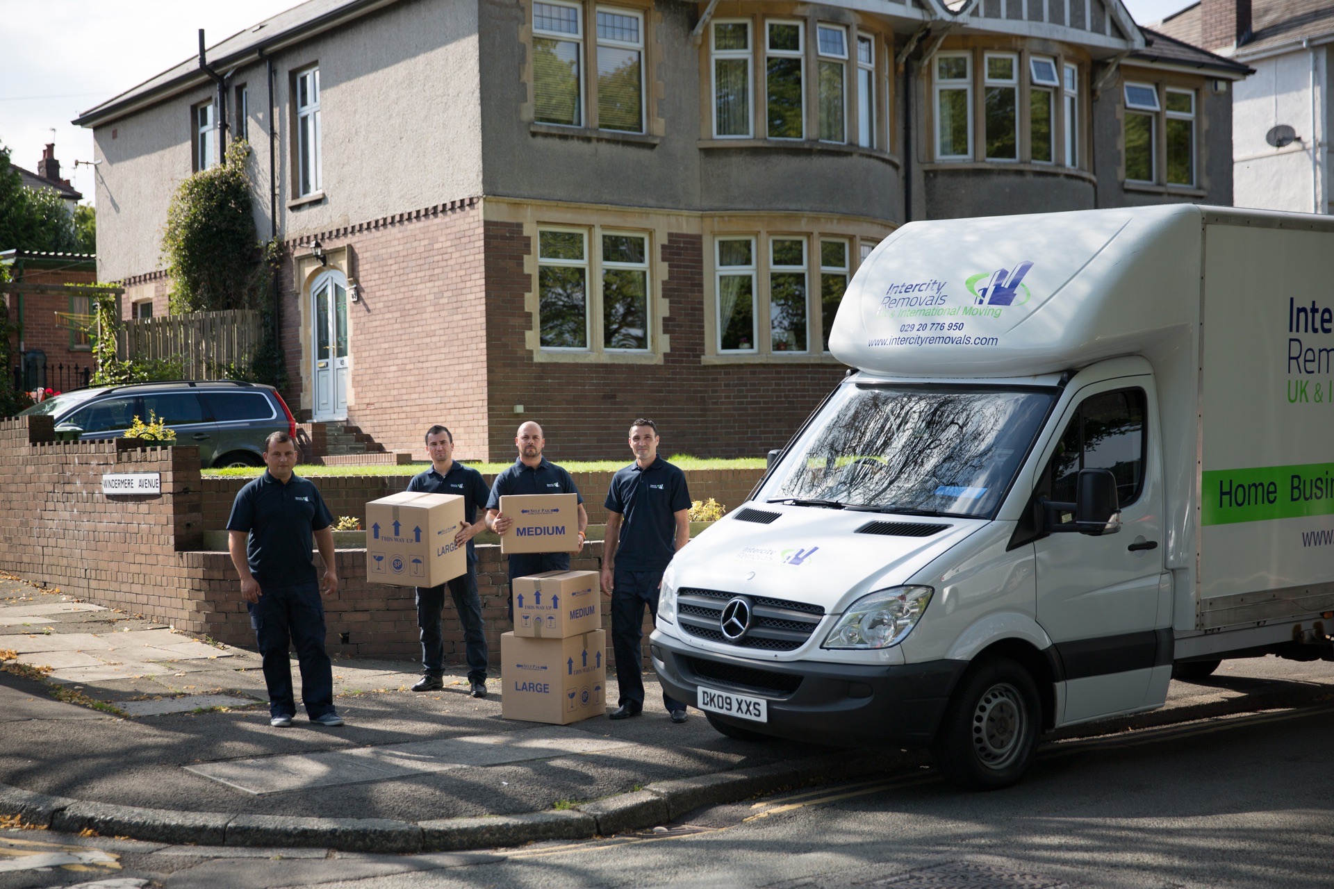 Office removals vehicle outside a Cardiff property